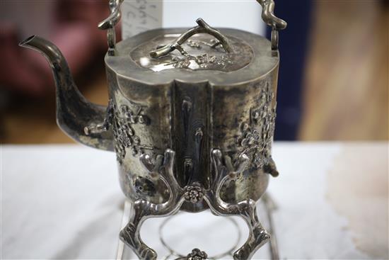 A late 19th/early 20th century Chinese export silver three piece tea set by Hung Chong & Co, Shanghai, gross 65 oz.